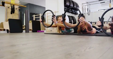 Beautiful women exercising in fitness studio Stock Footage