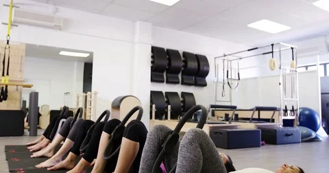 Beautiful women exercising in fitness studio Stock Footage