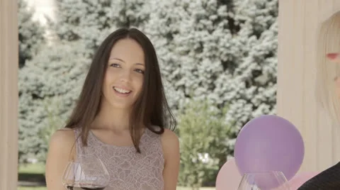 Beautiful women having fun while drinking wine. Stock Footage 22970582