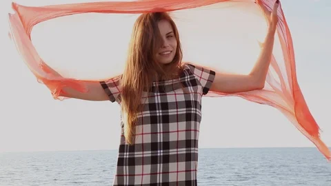 Beautiful women shawl develops on the wind Video stock 88622557