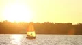 Beautiful yacht on sea at sunset, sailing under wind, sports HD Footage