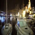 Beautiful yachts and boats moored in harbor near embankment, quiet city evening 4k or 4k+ Resolution