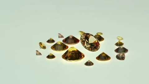 .beautiful yellow diamonds in different size on white background. Stock Footage 252433105