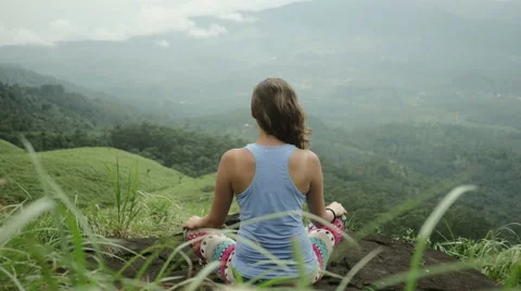 Beautiful yoga woman from behind meditating Stock Footage 59676778
