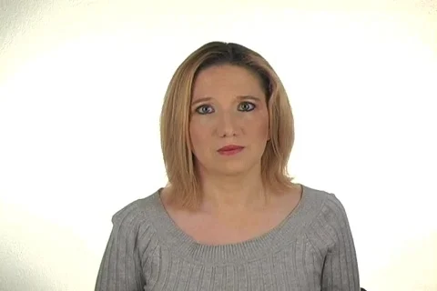 Beautiful Young Blonde Shrugs Her Shoulders Stock Footage
