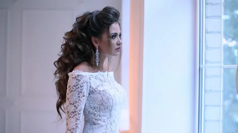 Beautiful young bride posing dolly slow motion 스톡 동영상 68107790