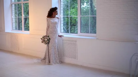 Beautiful young bride posing dolly slow motion Stock Footage 68107803