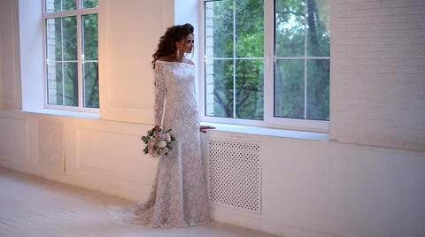 Beautiful young bride posing dolly slow motion Stock Footage 68107840