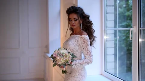 Beautiful young bride posing dolly slow motion Stock-Footage 68107906