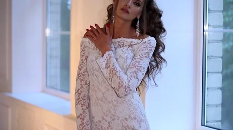 Beautiful young bride posing dolly slow motion Stock Footage 68107941