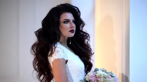 Beautiful young bride posing dolly slow motion 스톡 동영상 68109544