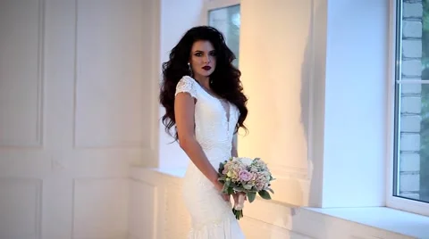 Beautiful young bride posing dolly slow motion Stock-Footage 68109594