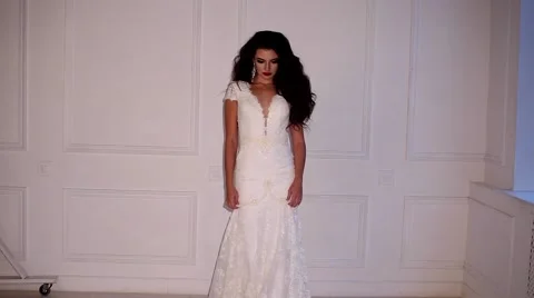Beautiful young bride posing dolly slow motion Stock Footage 68110162