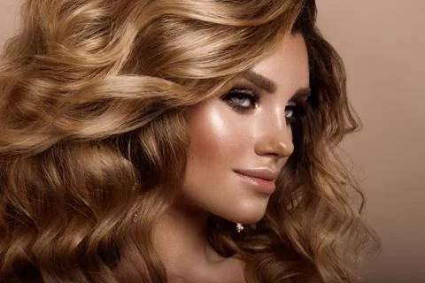 Beautiful young brunette with make-up Stock Photos