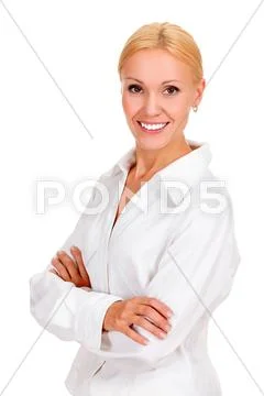 Beautiful young businesswoman standing with hands folded Stock Photos