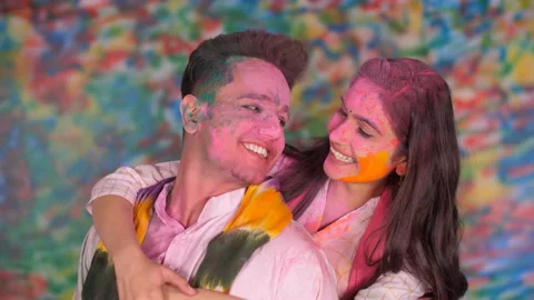 A beautiful young couple back hugging each other with their faces covered wit... Stock Footage 171113639