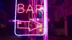 Neon bar sign medium shot . Night exteri, Stock Video