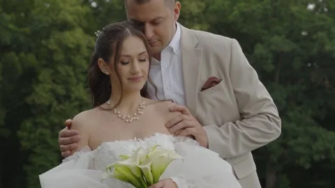 A beautiful young couple, a guy and a girl, a couple in love. Stock Footage 340566156