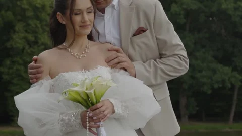 A beautiful young couple, a guy and a girl, a couple in love. Stock Footage 340566158