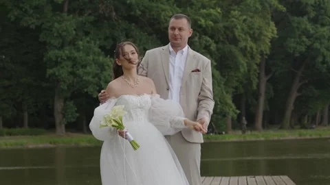 A beautiful young couple, a guy and a girl, a couple in love. Stock Footage 340566180