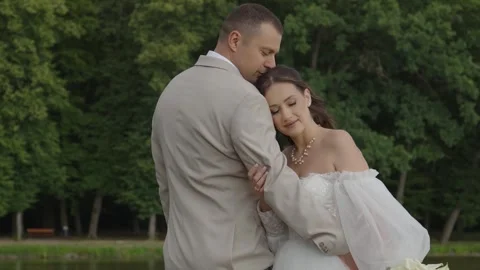 A beautiful young couple, a guy and a girl, a couple in love. Stock Footage 340566382