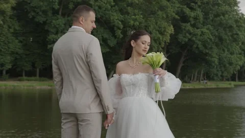A beautiful young couple, a guy and a girl, a couple in love. Stock Footage 340566422