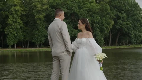 A beautiful young couple, a guy and a girl, a couple in love. Stock Footage 340566592