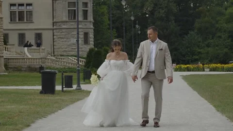 A beautiful young couple, a guy and a girl, a couple in love. Stock Footage 340566629