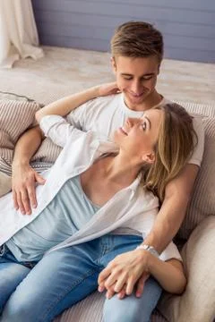 Beautiful young couple at home Stock Photos