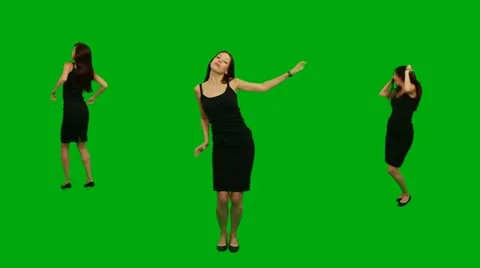 Beautiful young girl dancing against green screen Stock Footage