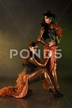 Beautiful young girl in the mask Stock Photos