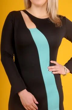 Beautiful young girl  posing on a yellow background Stock Photos