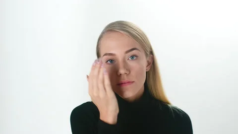 Beautiful young lady applying moisturizing creme, skin care concept Stock Footage 145933055