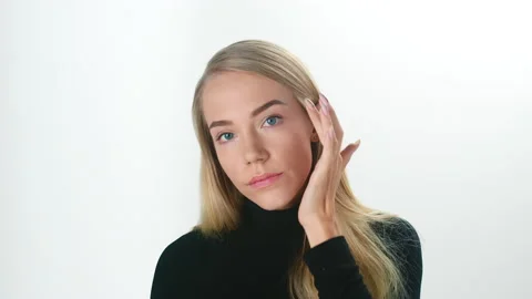 Beautiful young lady applying moisturizing creme, skin care concept Stock Footage 145933197