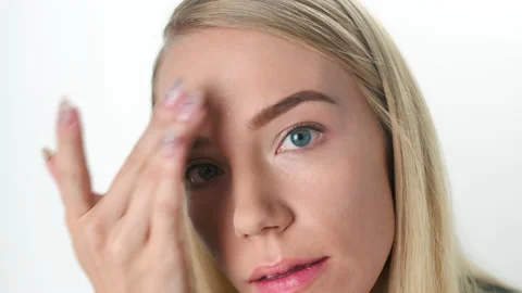 Beautiful young lady applying moisturizing creme, skin care concept Stock Footage 145933685