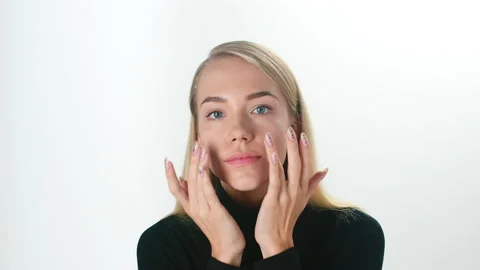Beautiful young lady applying moisturizing creme, skin care concept. Stock Footage 146088890