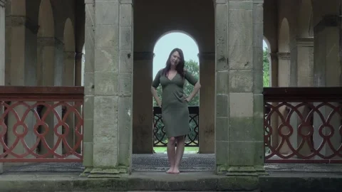 Beautiful young lady posing and smiling Stock Footage 137183831