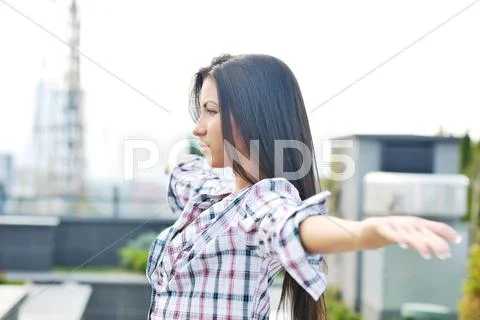 Beautiful young lady posing in garden Stock Photos