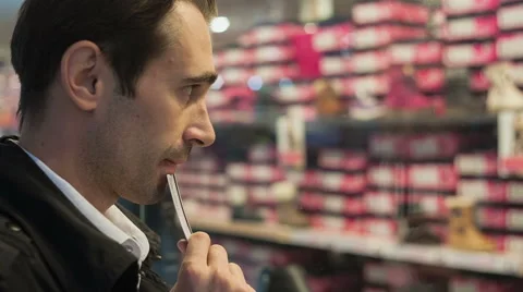 Beautiful young man do not have enough funds on the card to make a desired Stock Footage 43501830