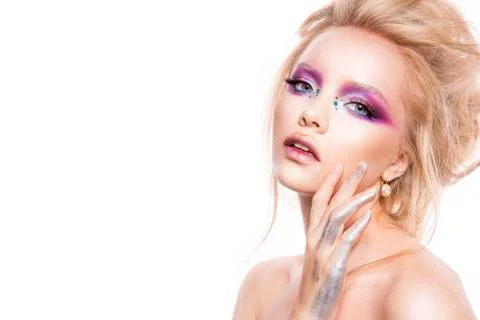 Beautiful young model with bright make-up Stock Photos