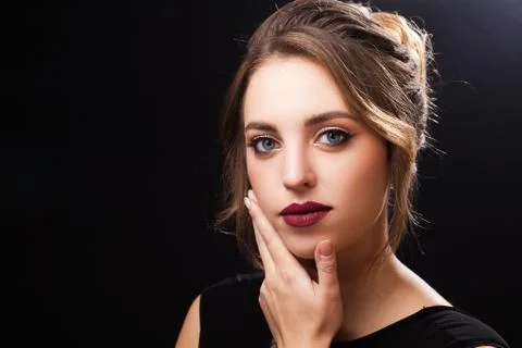 Beautiful young model with elegant makeup Stock Photos
