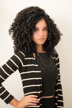 Beautiful Young Model Posing with Big Gorgeous Black Sexy Curly Hair. Stock Photos