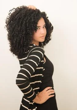Beautiful Young Model Posing with Big Gorgeous Black Sexy Curly Hair. Stock Photos