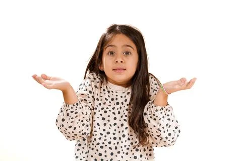 Beautiful young model posing with questioning or confused expression for chil Stock Photos