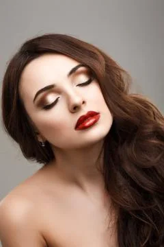 Beautiful young model with red lips Stock Photos