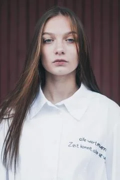 Beautiful young model without emotion, the girl in the white shirt, Stock Photos