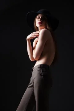 Beautiful young topless model in hat Stock Photos