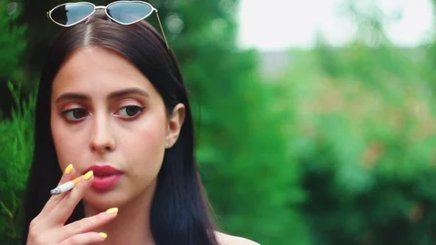 Beautiful young woman with perfect face | Stock Video | Pond5