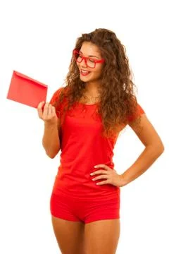 Beautiful young woman in red holding red envelope Stock Photos