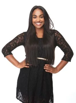 Beautiful young woman smiling in black dress Stock Photos